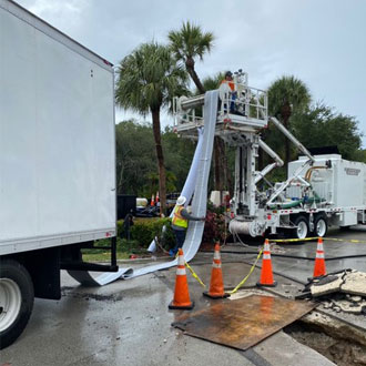 Shenandoah workers and trucks -Pipe Rehabilitation