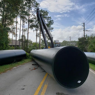 Shenandoah workers and crane and large pipeline - Careers and training