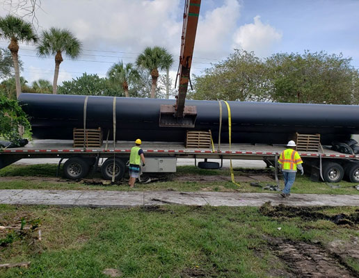 Shenandoah workers with truck holding pipeline to be replaced - Slip Lining