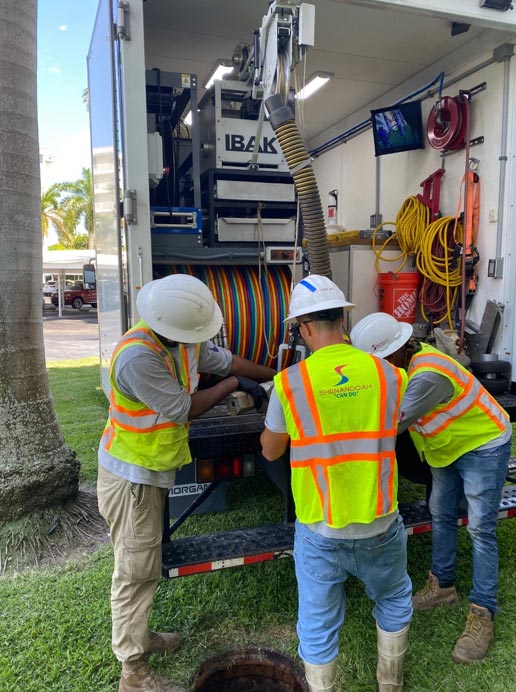 Shenandoah workers extending cable -Pipeline Video Inspection (CCTV)
