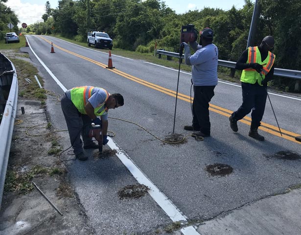 Shenandoah workers on road -Seawall And Enbankment
