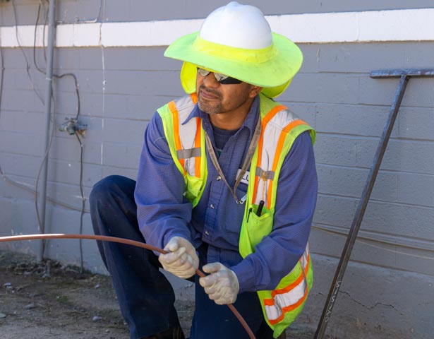 Shenandoah worker extending cable -Pipeline Video Inspection (CCTV)